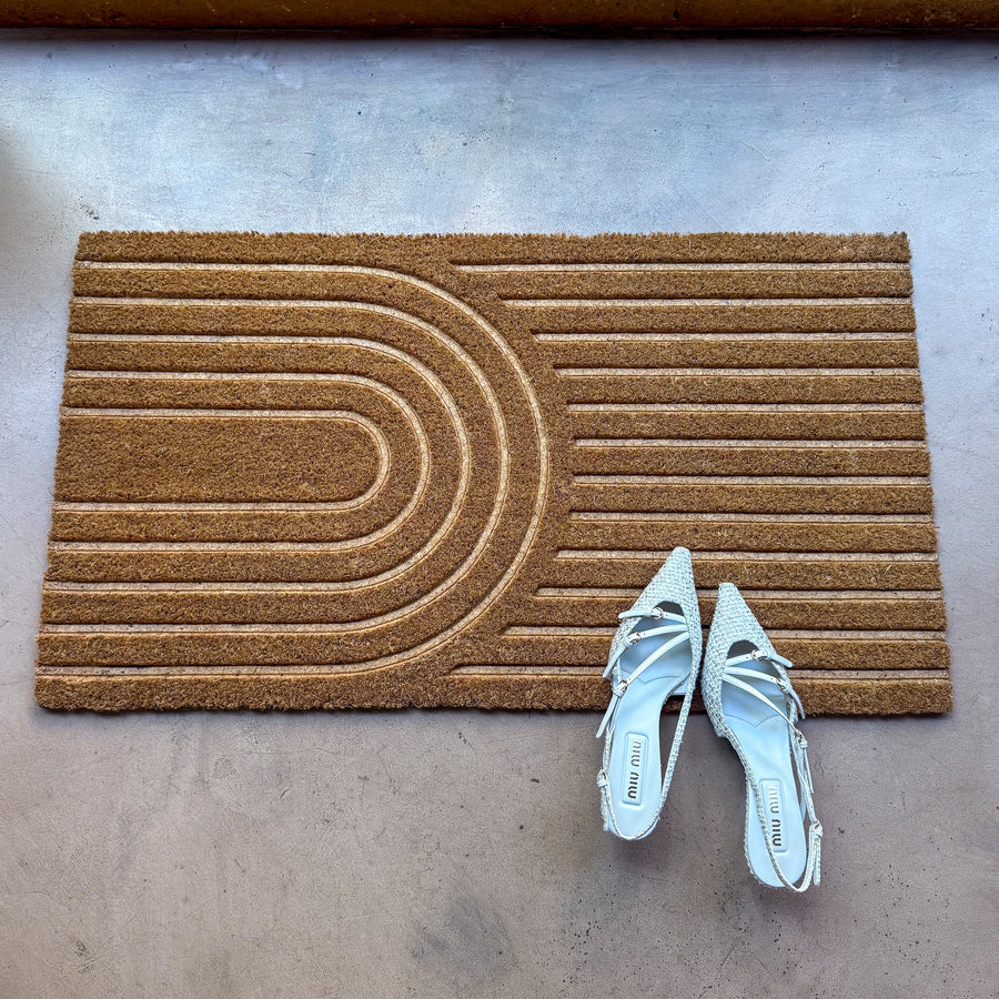 Carved umbra Door Mat